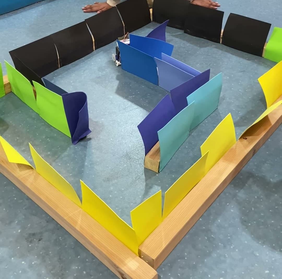 Robot testing route through a colorful maze course